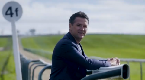 Michael Owen looking over the gallops where his horses train and receive premier league care.