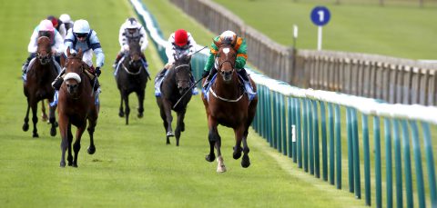 Lone Eagle and Silvestre De Sousa (right) winning The Godolphin Flying Start Zetland Stakes from Recovery Run Newmarket